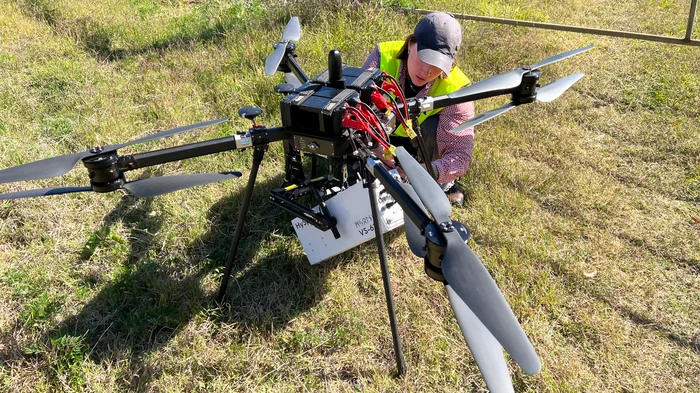 Dr. Friederike Körting setting up the HySpex camera in a UAV configuration for airborne data acquisition